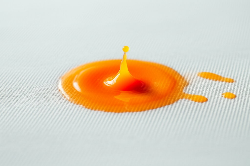 Generate a high-quality, relevant image prompt for an article about: Does Juice From An Orange Stain